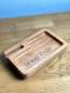 Preview: Catchalltray "HOME" with smartphone dock made of cherry wood with personal coordinate engraving
